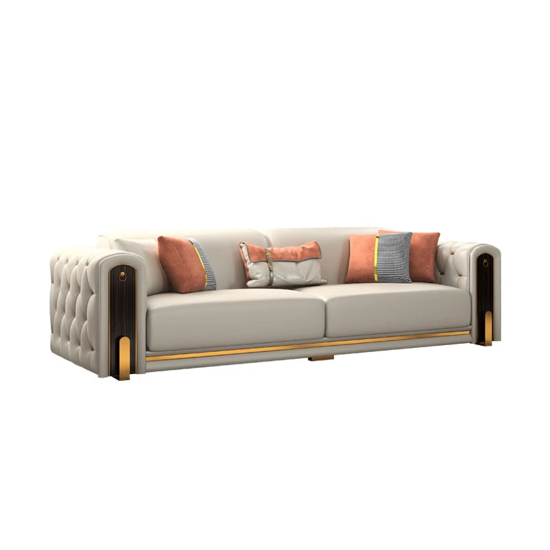 Luxury Leather Sofa with Gold Accents & Pillows